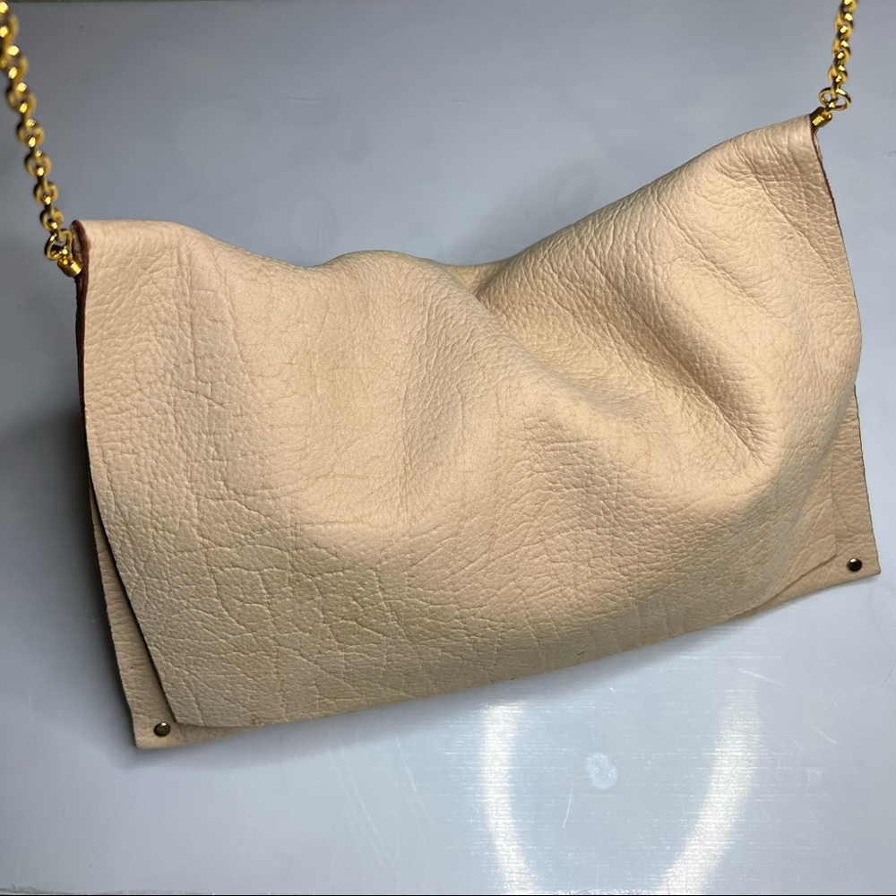 Elegant Cream Clutch with Gold Chain
